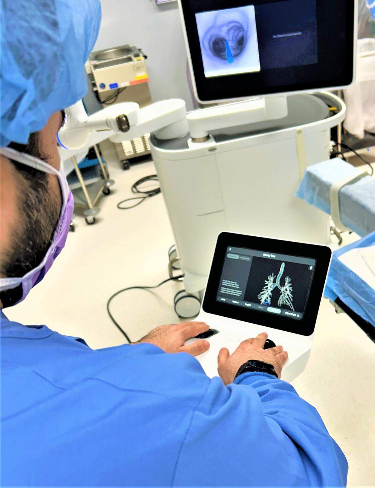 Dr. Mohammed Abo Khamis with Ion robotic technology at Doctors Medical Center in Modesto.