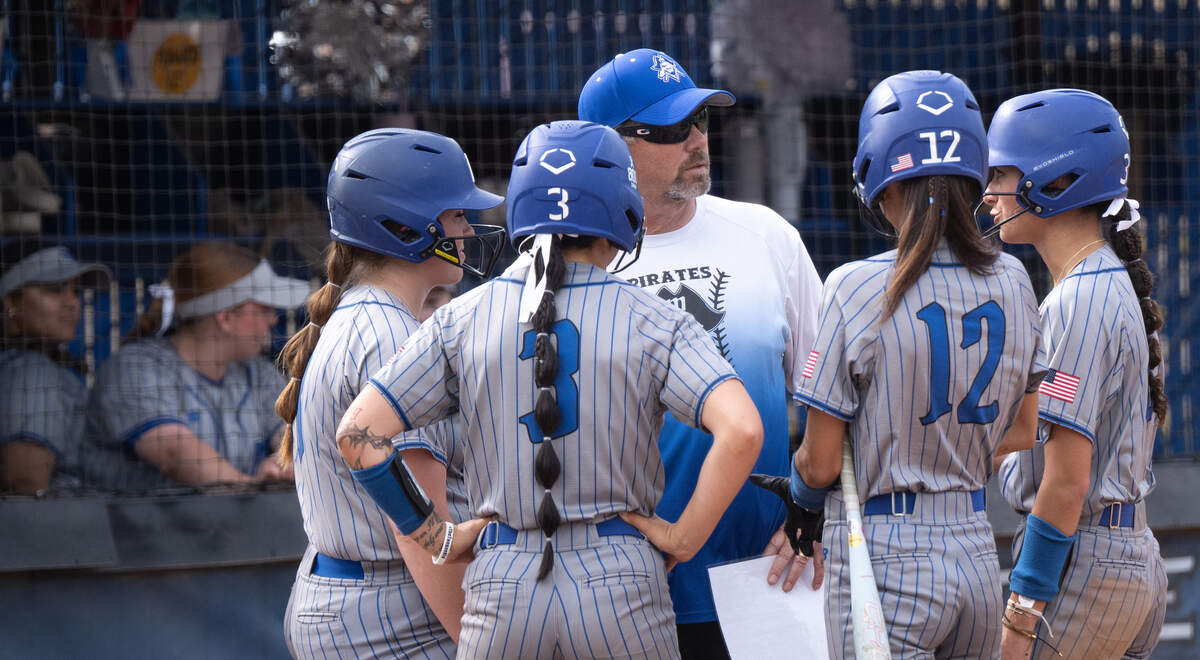 Modesto head coach Donnie Donaldson talks with his players during the game with Santa Rosa at Modesto Junior College in Modesto, Tuesday, April 15, 2025.