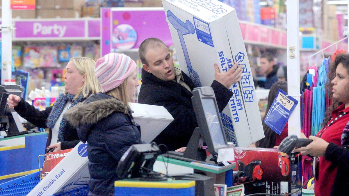 On Nov. 22, 2012, Ceres' Scott Conway and wife Jacqulyn check out  at the Toys R Us on Sisk Road in Modesto before rushing off to Target for more early Christmas shopping on "black Thursday."