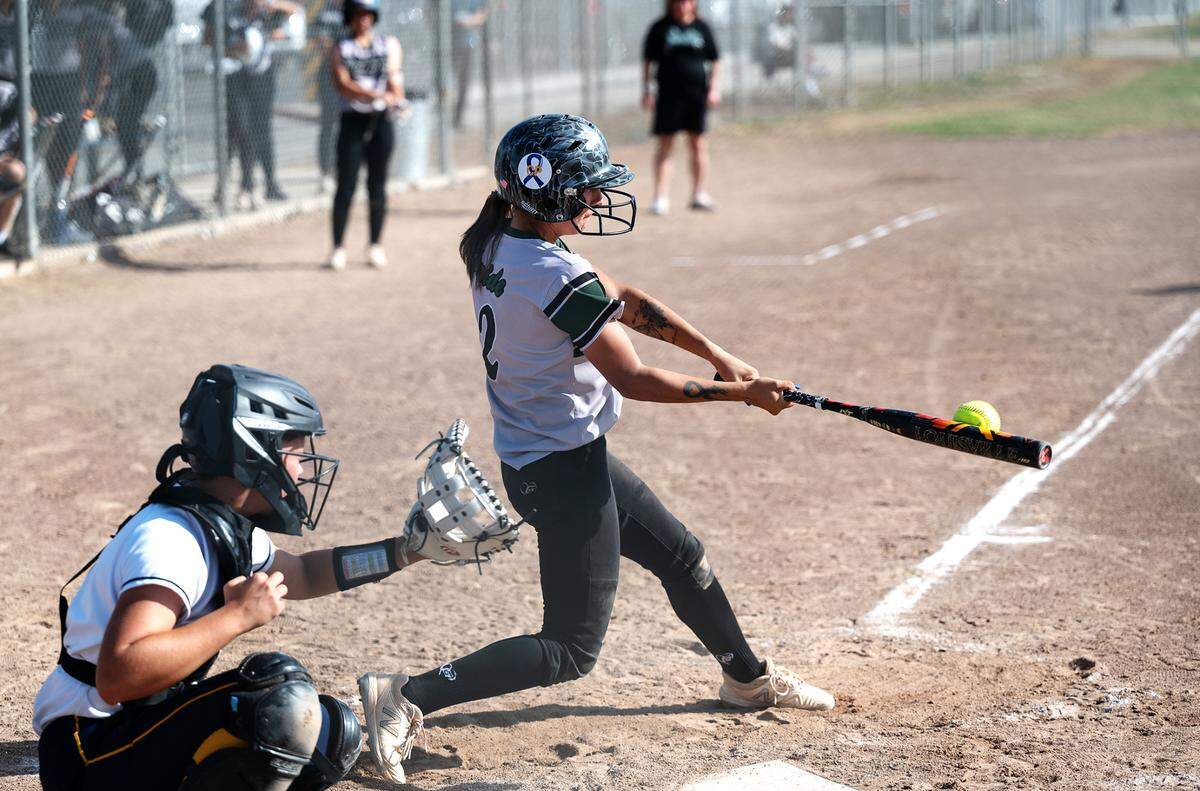 Pitman’s Kayleen Zayehmoureh connects with a two-run home run during the Central California Athletic League game with Turlock at Turlock High School in Turlock, Calif., on Thursday, April 7, 2022. Turlock won the game 8-2.