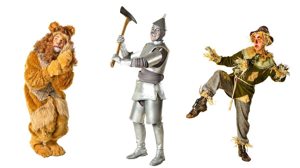 Daniel S. Hines as the Lion, Sam Bravo is the Tin Man, and Cameron Chang plays the Scarecrow in the Sierra Repertory Theatre production of The Wizard of Oz.