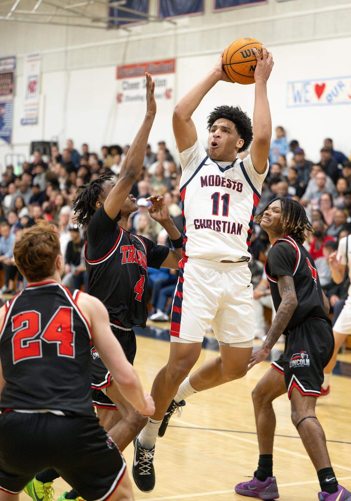 Modesto Christian’s Gavin Sykes scored 45 points to lead the Crusaders over Lincoln in the Sac-Joaquin Section semifinal playoff game at Modesto Christian High School in Salida, Tuesday, Feb. 25, 2025.