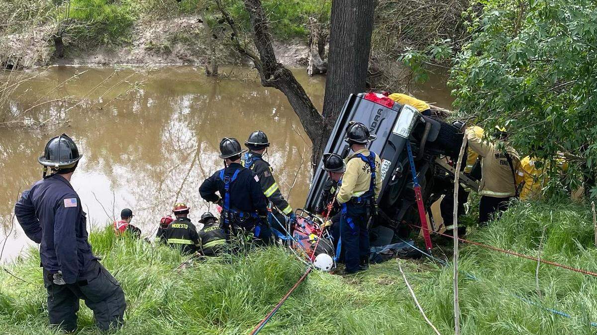 A crash down the Dry Creek embankment along Scenic Drive near Coffee Road in Modesto killed one woman and badly injured another Saturday morning, March 18, 2023.