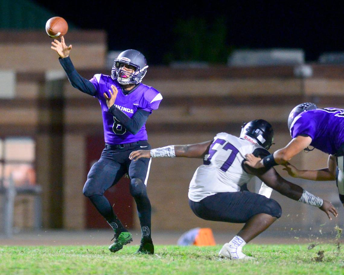 Johansen quarterback John Romero (8) throws the ball over the middle during a game between Johansen High School and Pacheco High School at Johansen High School in Modesto California on September 20, 2019.