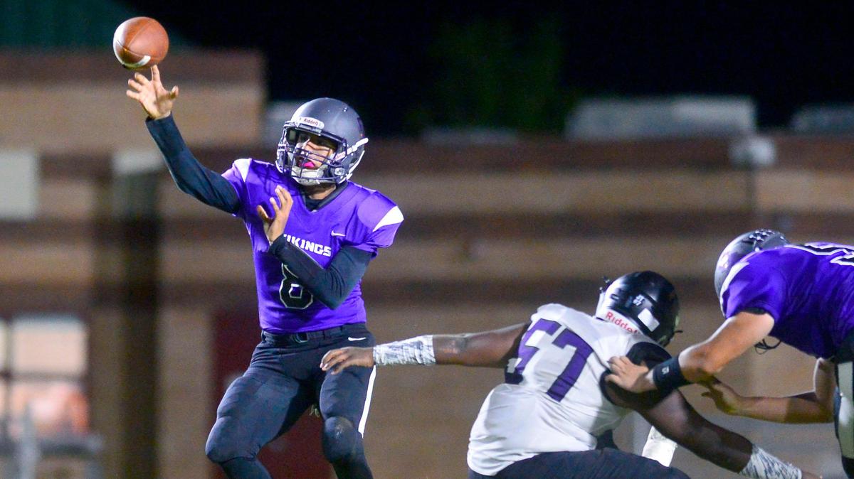 Johansen quarterback John Romero (8) throws the ball over the middle during a game between Johansen High School and Pacheco High School at Johansen High School in Modesto California on September 20, 2019.