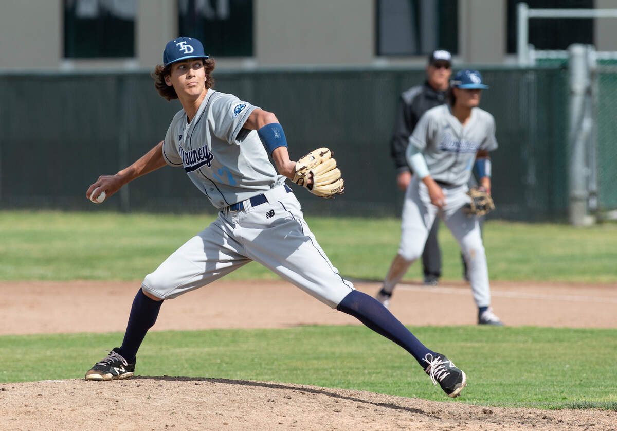 Downey’s Aiden Larson delivers a pitch during the Central California Athletic League game with Pitman at Pitman High School in Turlock, Calif., Tuesday, May 2, 2023.
