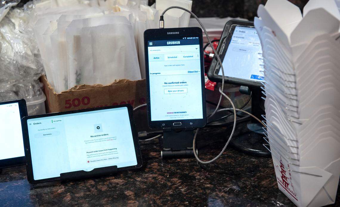 Delivery service tablets at GK Mongolian BBQ in Modesto, Calif., on Friday, Feb. 19, 2021.