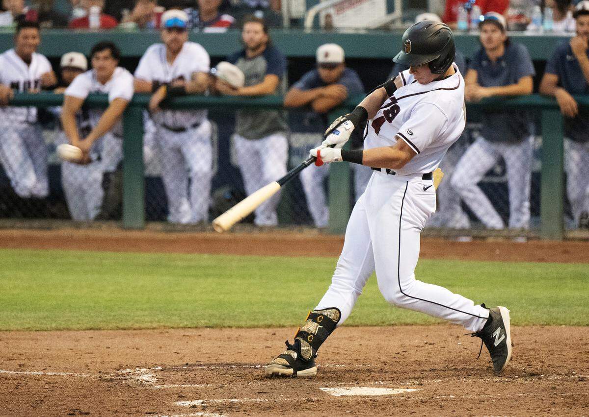 Modesto’s Colt Emerson drives a two-run double in the game with the Fresno Grizzlies at John Thurman Field, in Modesto, Calif., Wednesday, July 3, 2024. Modesto won the game 6-3.