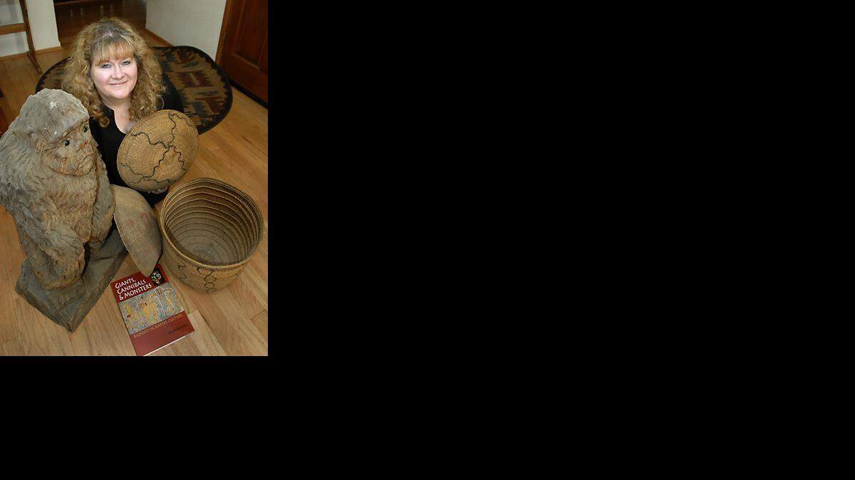 Kathy Moskowitz Strain has written a book, ‘Giants, Cannibals, and Monsters: Bigfoot in Native Culture,’ and gives lectures about the subject. Strain has many American Indian baskets and a wood sculpture of bigfoot at her Jamestown home.   
(Debbie Noda/The Modesto Bee)