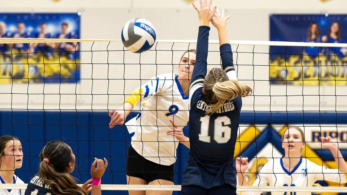 Ripon Christian’s Brynn Bohn spikes the ball past Central Catholic defender Molly McDonald during the Sac-Joaquin Section Division III quarterfinal playoff match with Central Catholic at Ripon Christian High School in Ripon, Thursday, Oct. 31, 2024. Ripon Christian won the match 3-2.