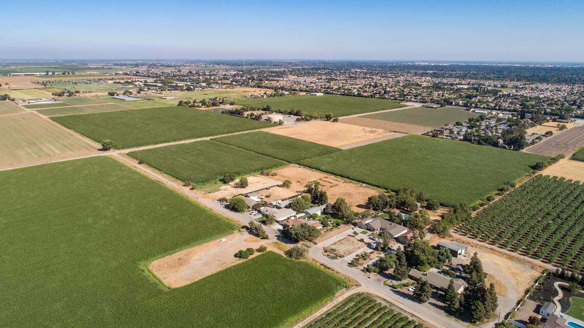 Future site of Tivoli housing development seen from Oakdale Road looking southeast towards Village One in Modesto, Calif., on Thursday, Aug. 5, 2021.