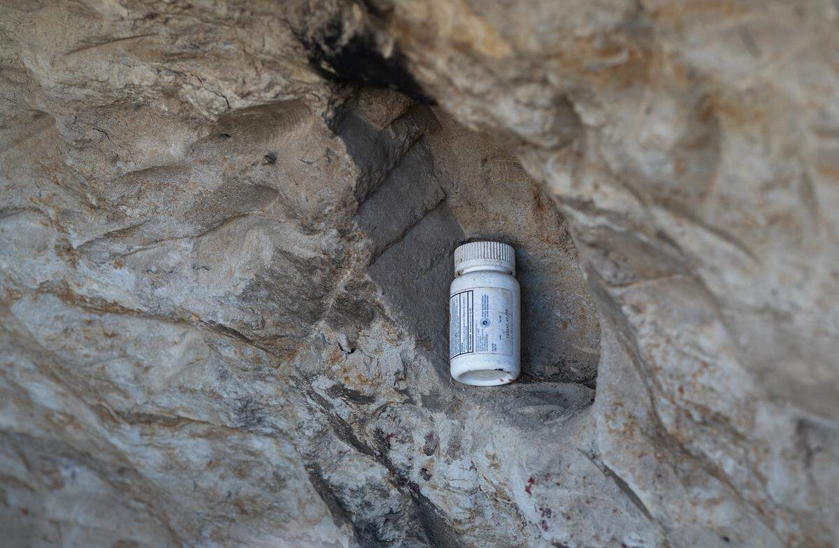 A small shelf has been carved inside a hand dug cave along the south side of the Tuolumne River near Crater Avenue in west Modesto, Calif., Thursday, Oct. 27, 2022.