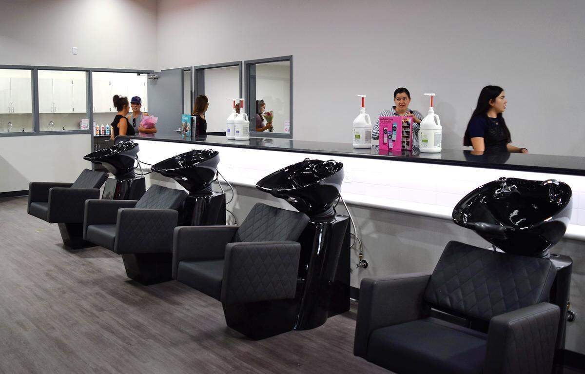 Community members tour Patterson High School’s new Barbering and Cosmetology Building on Aug. 9, 2025.