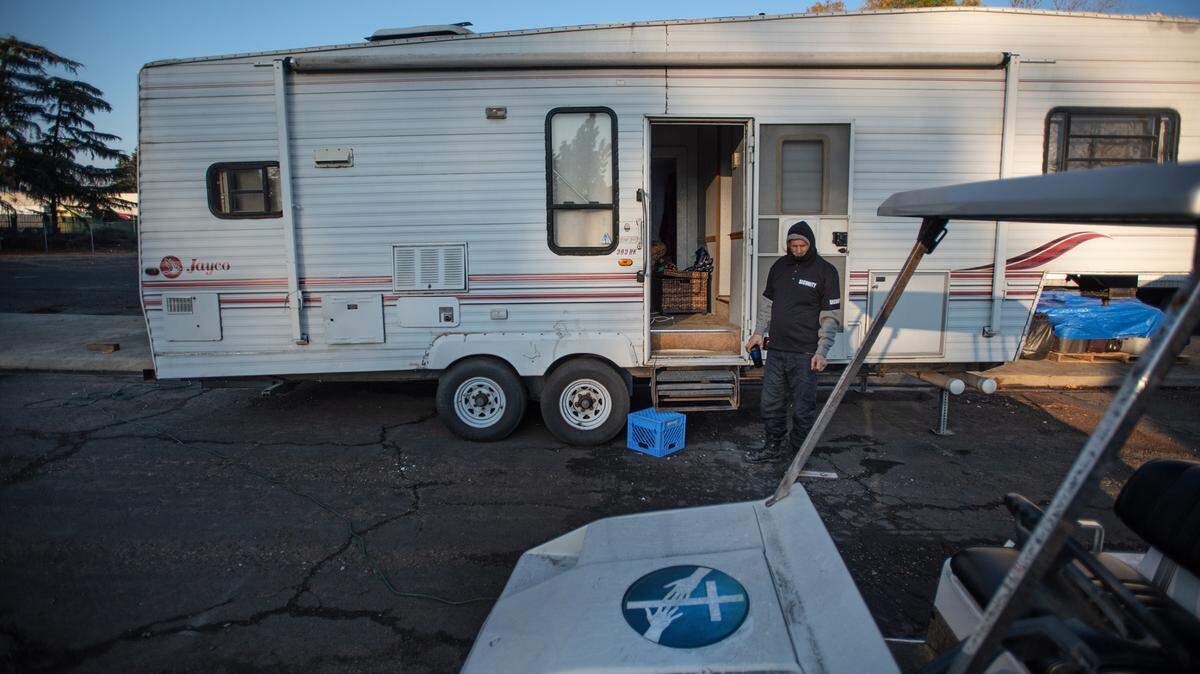 Keith Kain was formerly homeless in Turlock and now works as a security guard at the Turlock Gospel Mission’s temporary shelter in Manteca, Calif., Tuesday, Dec. 22, 2020. Kain now has mobile trailer to call home.