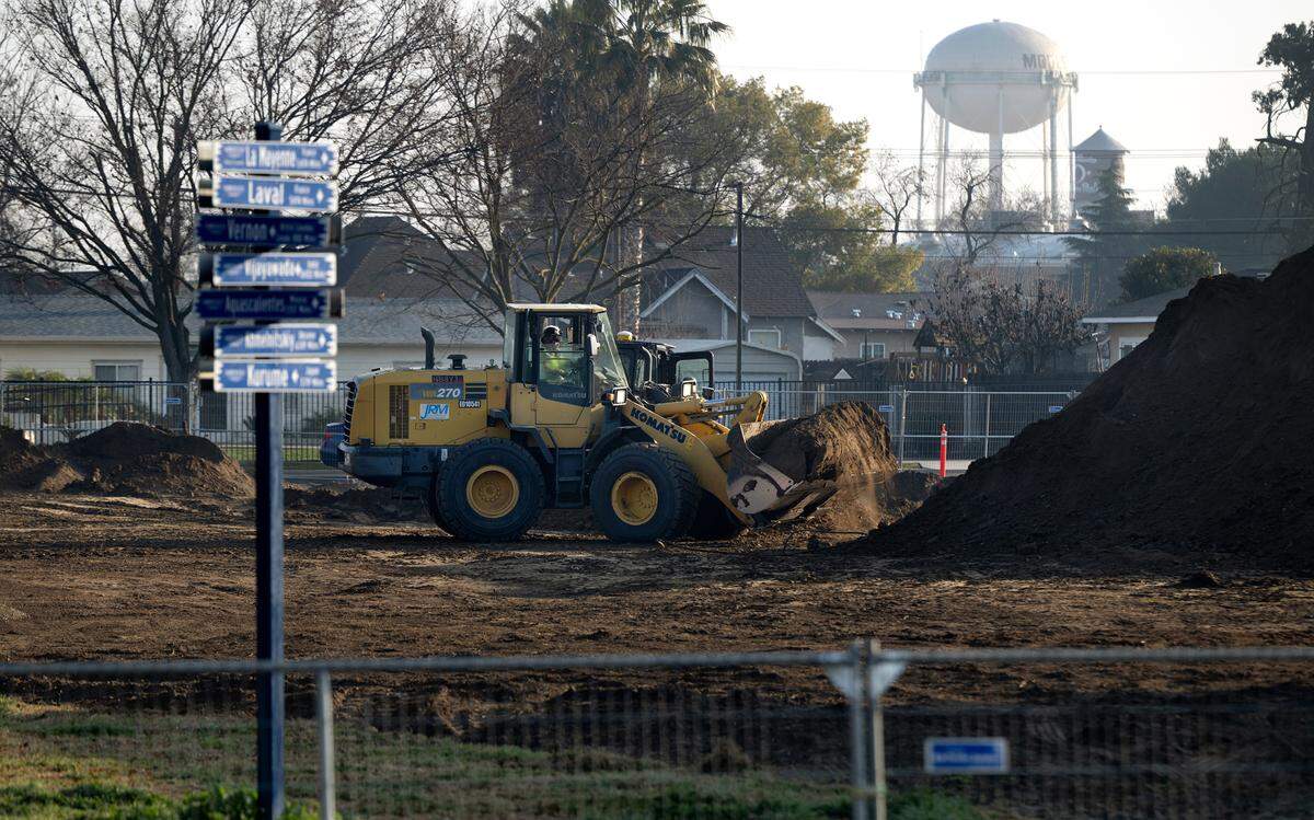 A crew works on the renovation of Cesar Chavez Park in Modesto, Thursday, Jan. 30, 2025.