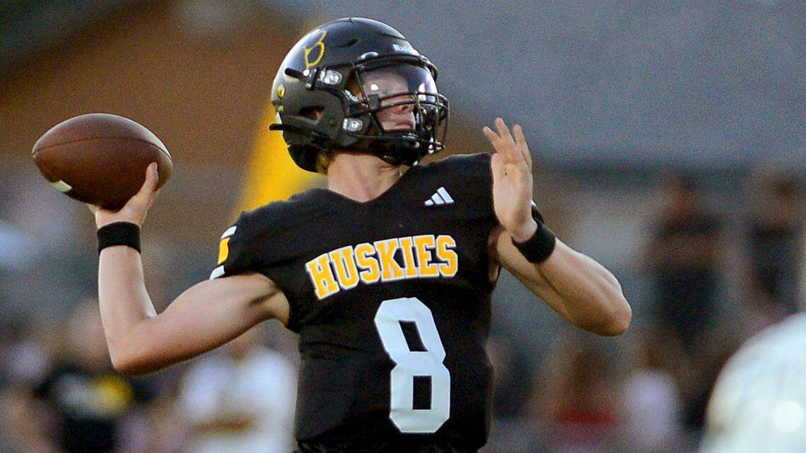 Hughson quarterback Robert McDaniel throws a deep pass during a game between Hughson High School and Central Valley High School at Hughson High School in Hughson California on August 25, 2023.