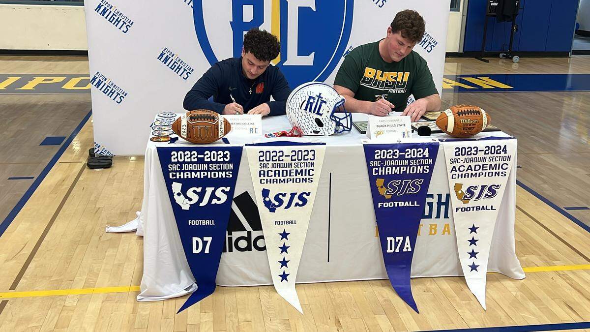 Ripon Christian High football players Brady Grondz and Carson Bunnell sign letters of intent to play college football during the football regular signing period on Feb. 7, 2023.