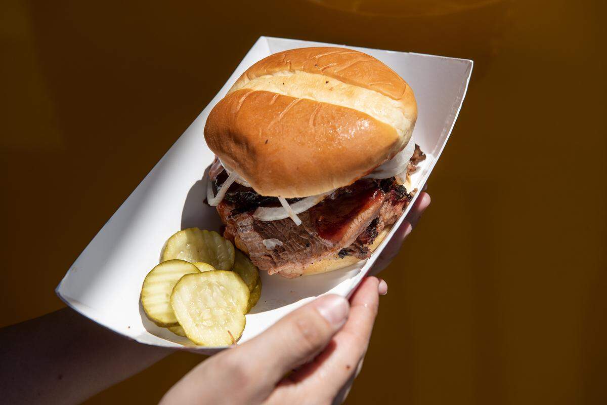 at West Side Ministries in Turlock, Calif., on Tuesday, August 4, 2020. Slick Fork BBQ food truck at the corner of Coffee Road and Scenic Drive in Modesto, Calif., on Saturday, August 1, 2020.