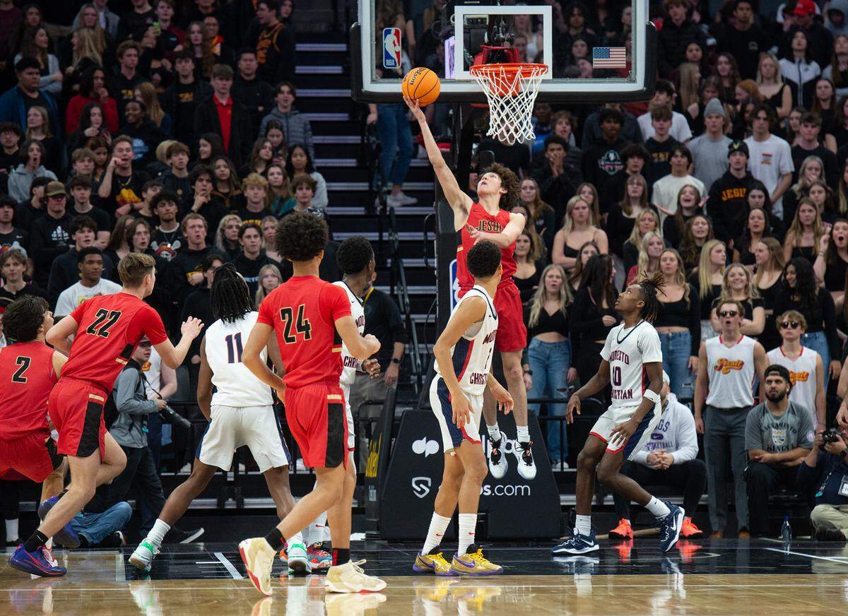 Jesuit’s Reid Jones scores on a reverse during the Sac-Joaquin Section Division I championship game with Modesto Christian at Golden 1 Center in Sacramento, Calif., Saturday, Feb. 25, 2023.