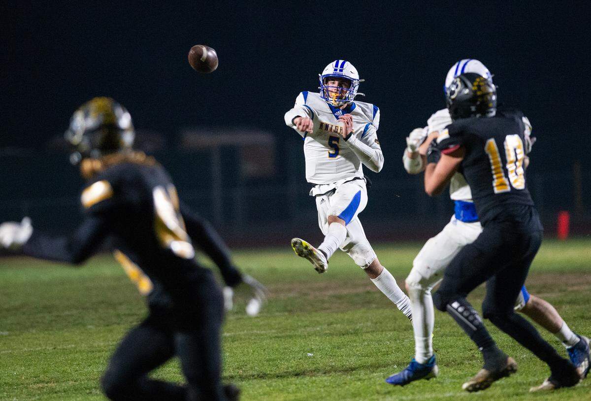 Ripon Christian quarterback Trey Fasani makes a pass during the CIF Division 5-AA Northern California Regional Bowl Game with Hughson on Friday, Dec. 2, 2022, in Hughson, Calif.