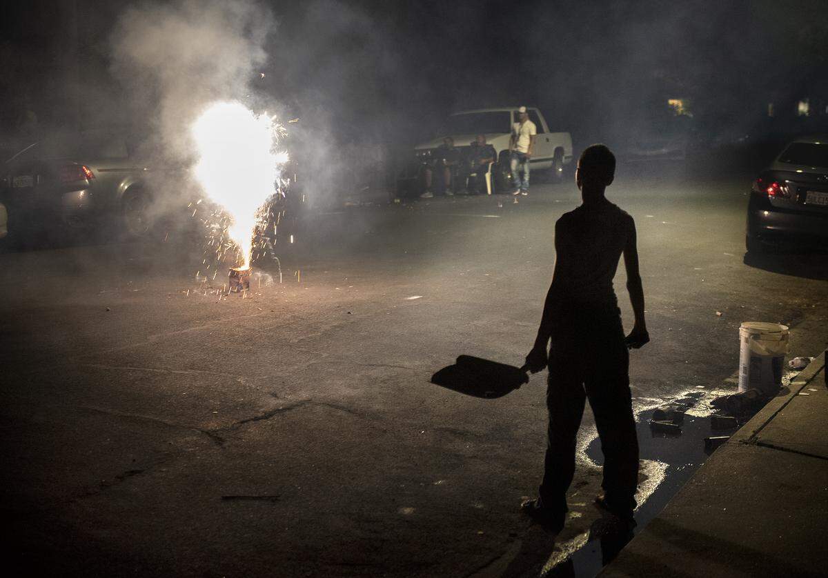 People shoot off fireworks in Modesto Calif., Thursday, July 4, 2019.