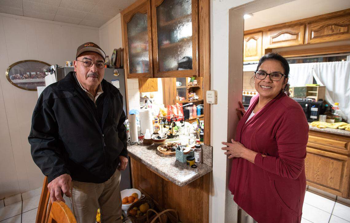 Yolanda and Antonio Lomeli at their home in Grayson, Calif., on Thursday, Dec. 30, 2021.