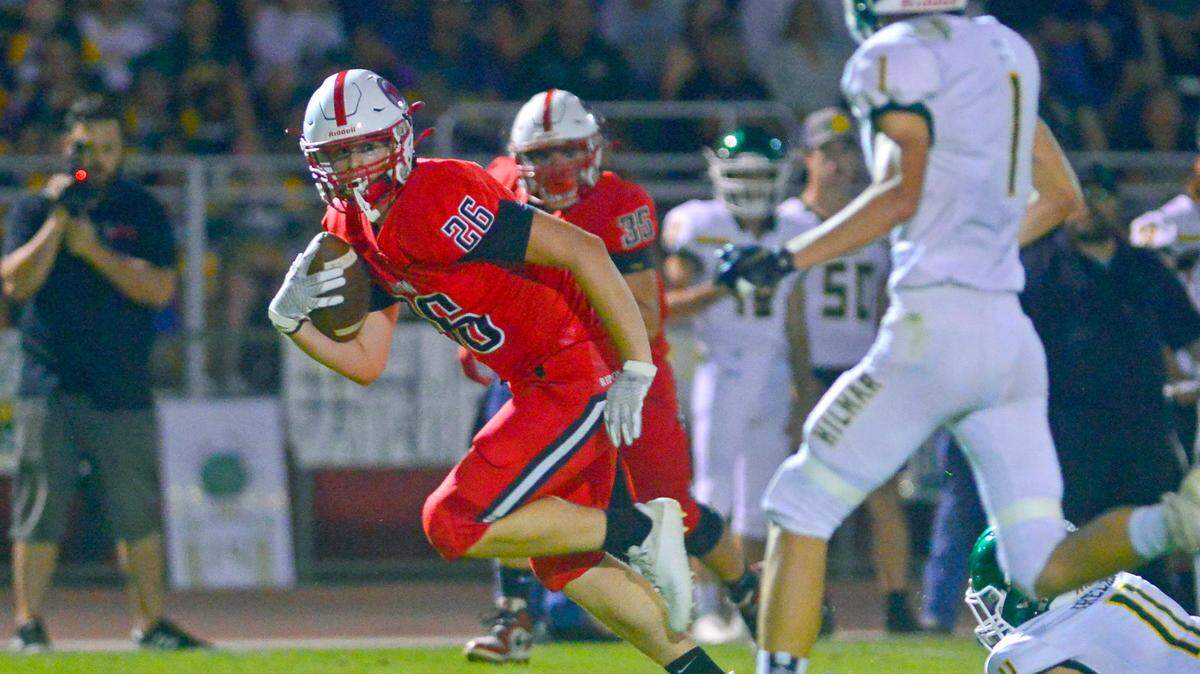 Ripon receiver Landon Thomas runs upfield after making a catch during a football game between Hilmar and Ripon High School at Ripon High School in Ripon CA on September 24, 2021