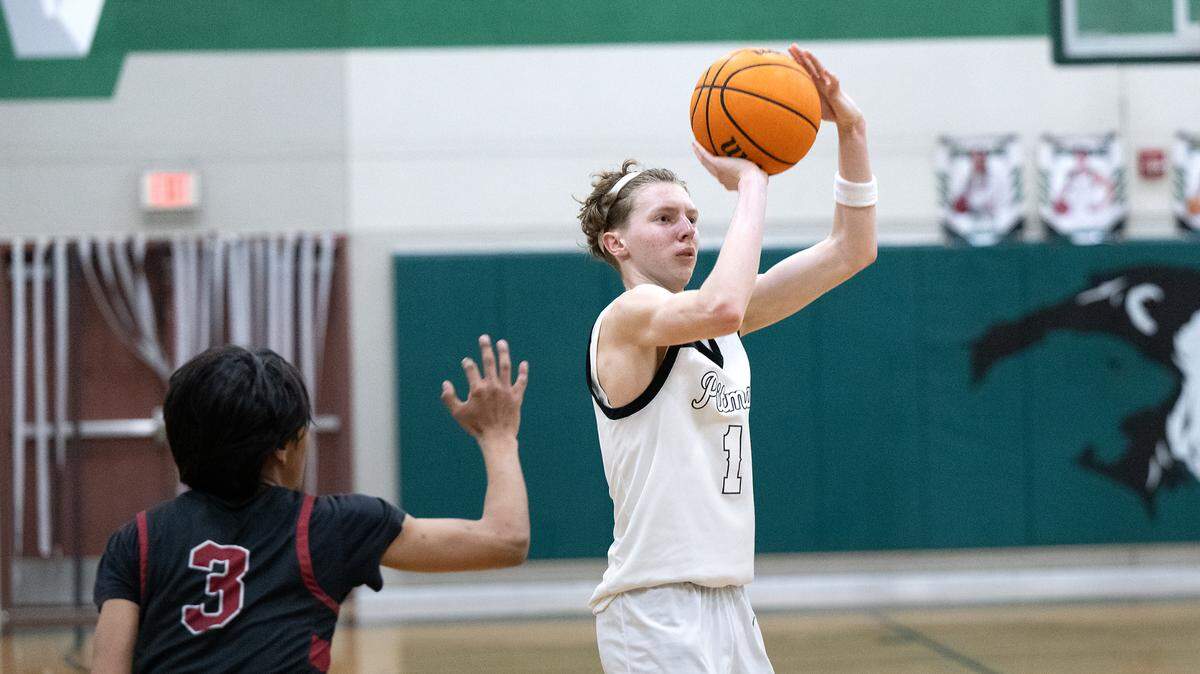 Pitman’s Avery Sanchez shoots a three-point basket during the Central California Athletic League game with Modesto in Turlock, Calif., Friday, Jan. 26, 2024.
