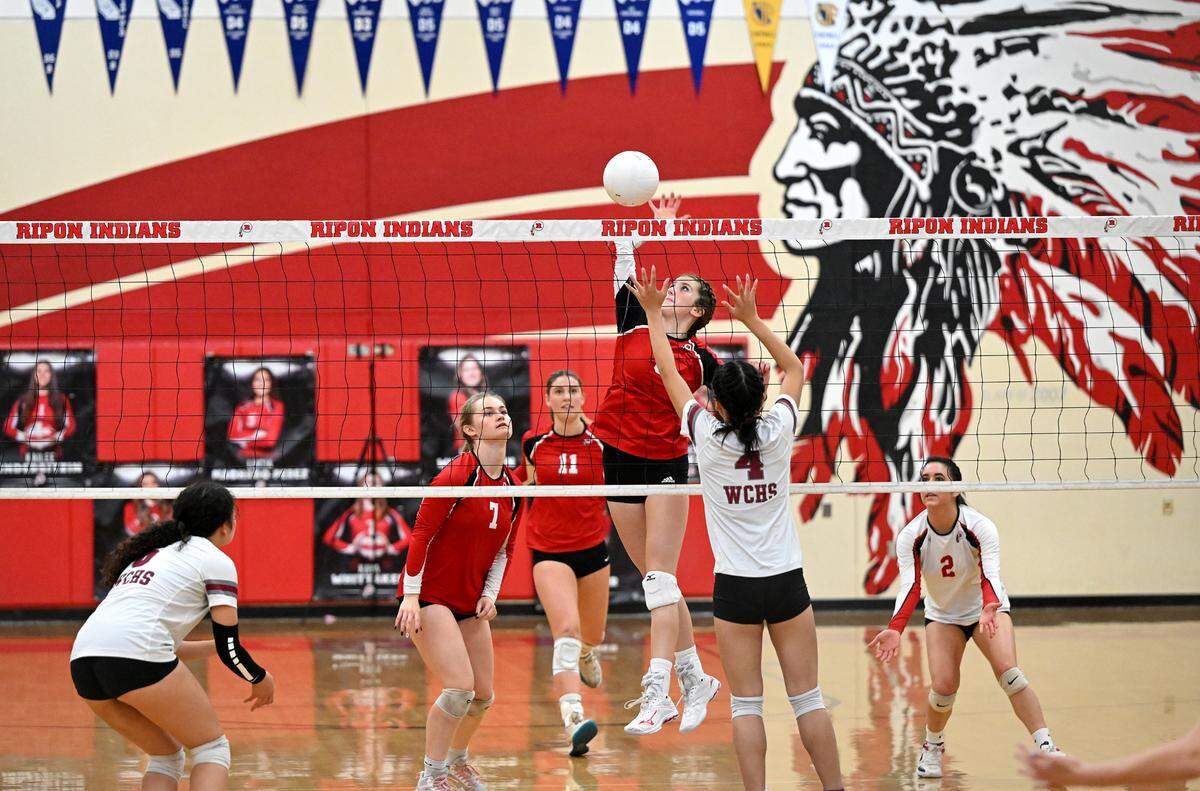 Ripon’s Olivia Neuman (6) spikes the ball during the Division IV semifinal playoff match with West Campus at Ripon High School in Ripon, Calif., Tuesday, Oct. 31, 2023.