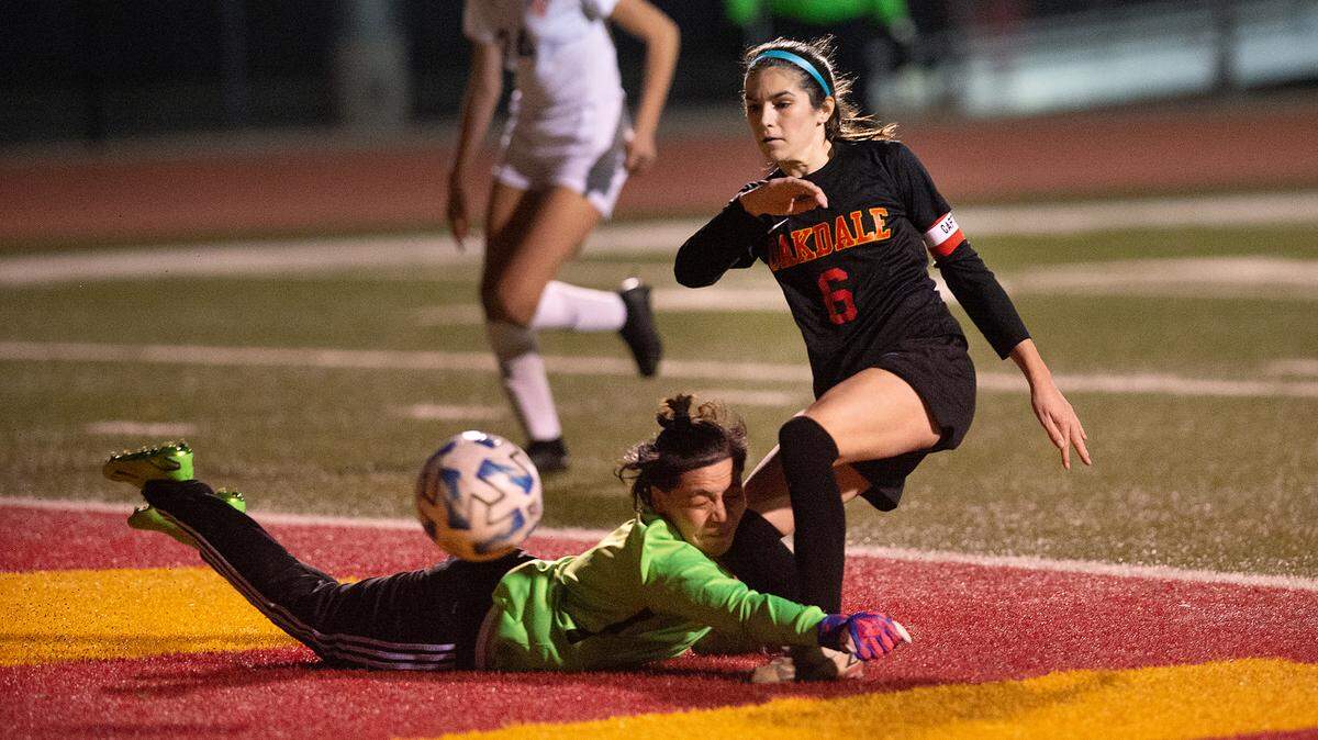 Oakdale’s Kyndra Obermeyer challenges the Kimball goalie during the Valley Oak League game with Kimball in Oakdale, Calif., Friday, Jan. 20, 2023.