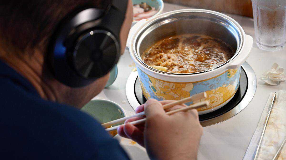 Justin Duguay eats lunch at Hawai’i Pot Shabu Shabu House in Modesto, Calif., Tuesday, May 14, 2024.
