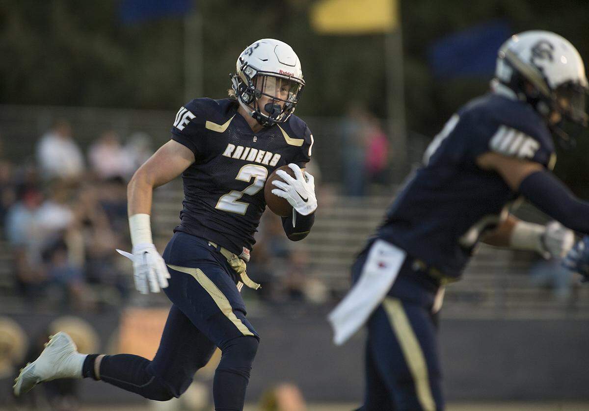Central Catholic running back Justin Rice ran for 102 yards and one touchdown during a non-conference game with Atwater in 2015.