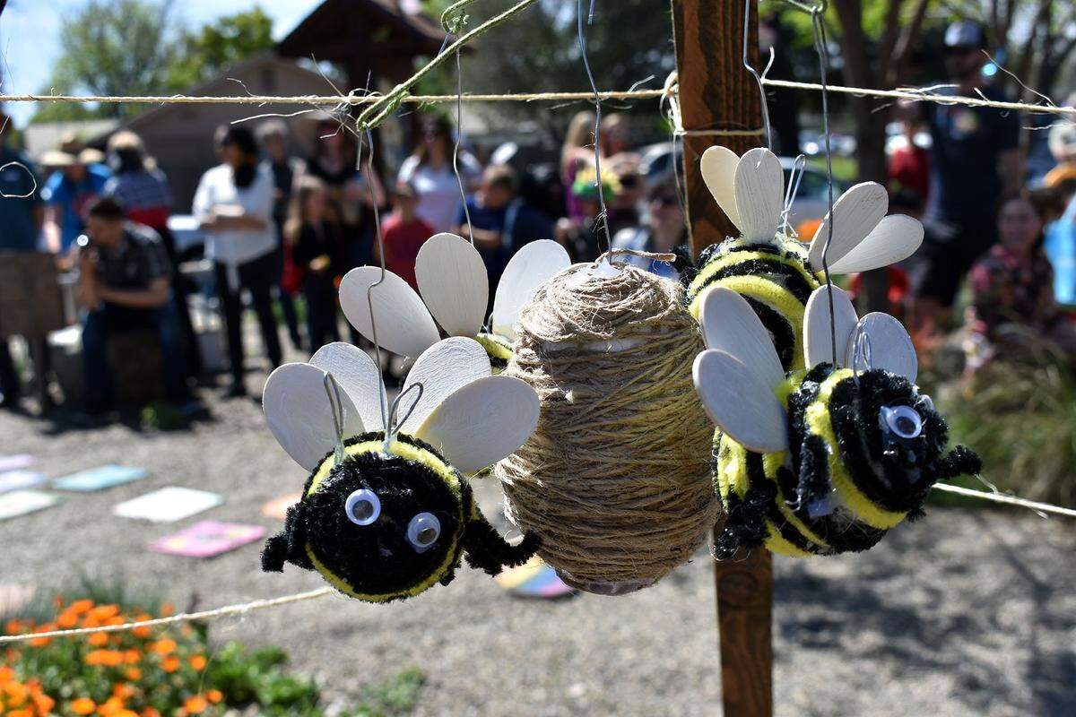 A bee mobile hangs in the children's garden in the La Loma Native Garden during the first Modesto Pollinator Festival in 2019.