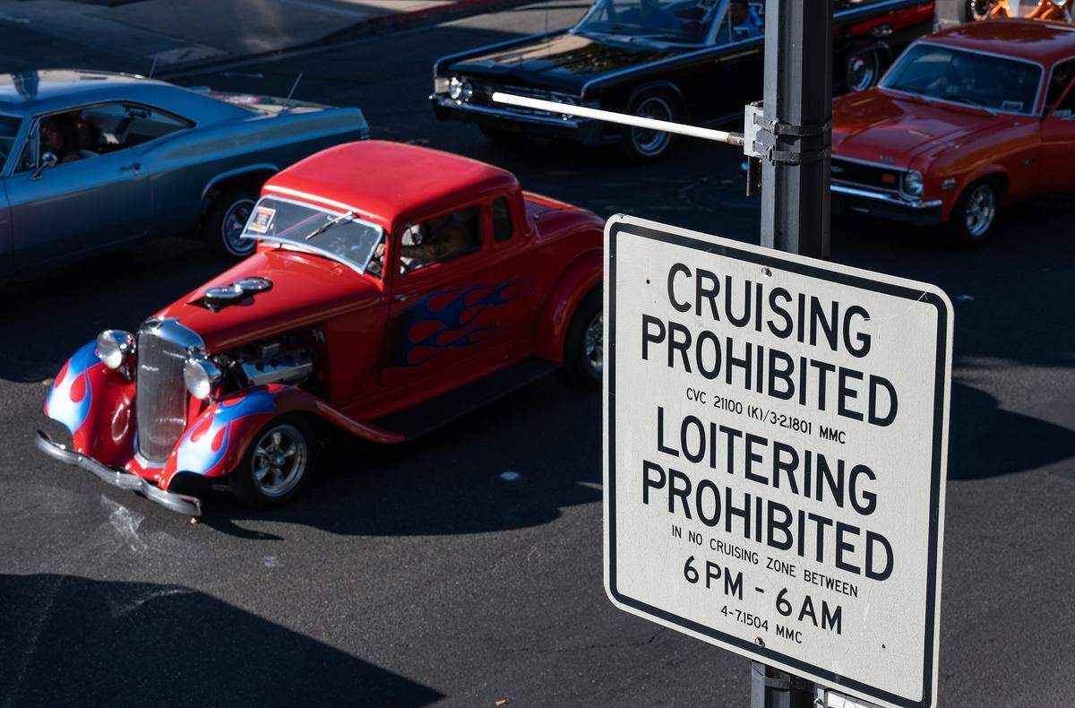 “Cruising” in Modesto has been banned since 1990 except during the annual American Graffiti car parade. Owners of classic cars cruise down J Street during the parade in Modesto, Calif., on Friday, June 10, 2022.