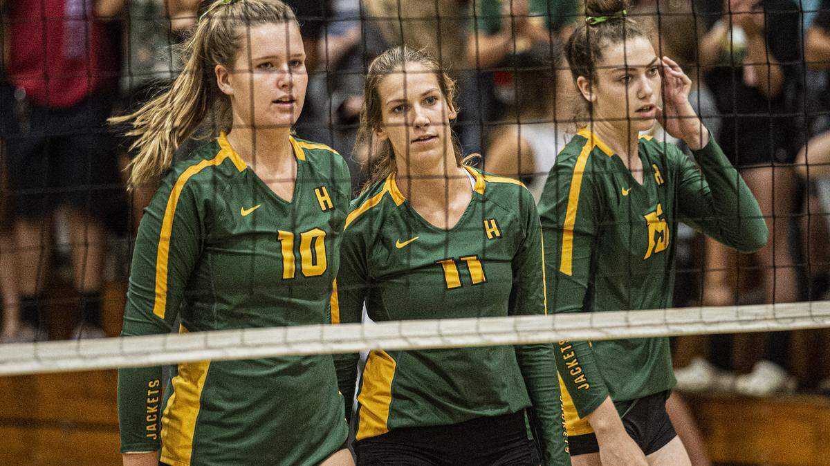 From left, the dominant trio of Olivia Peterson (10), Kayley Souza (11), and Mikela Labno (15) are poised for a big season, and showed it during their match against Beyer High, on Wednesday, August 29, in Hilmar.