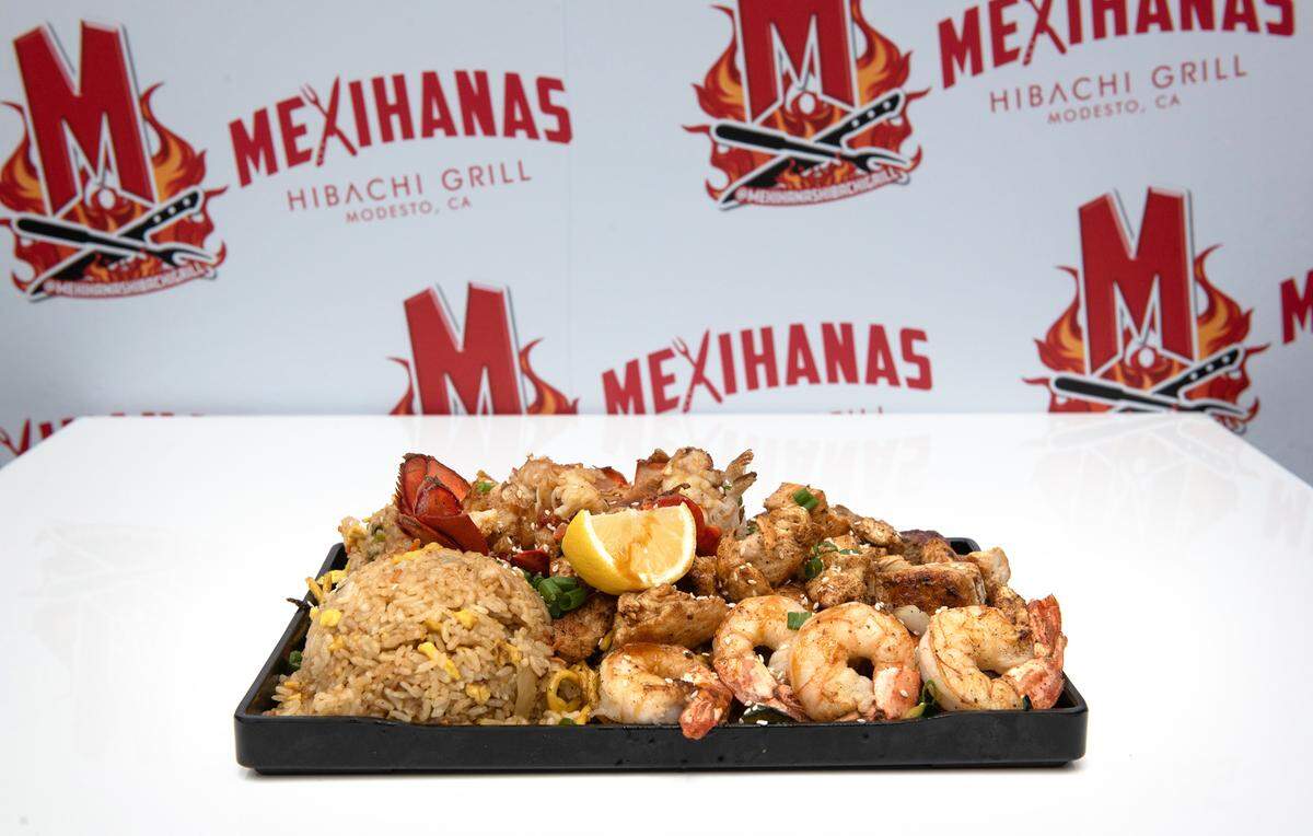 LBC combo (lobster tail, shrimp, angus steak and chicken) plus fried rice, garlic noodles and mixed veggies at Mexihanas Hibachi Grill in J Street in Modesto, Calif., Thursday, Dec. 8, 2022.