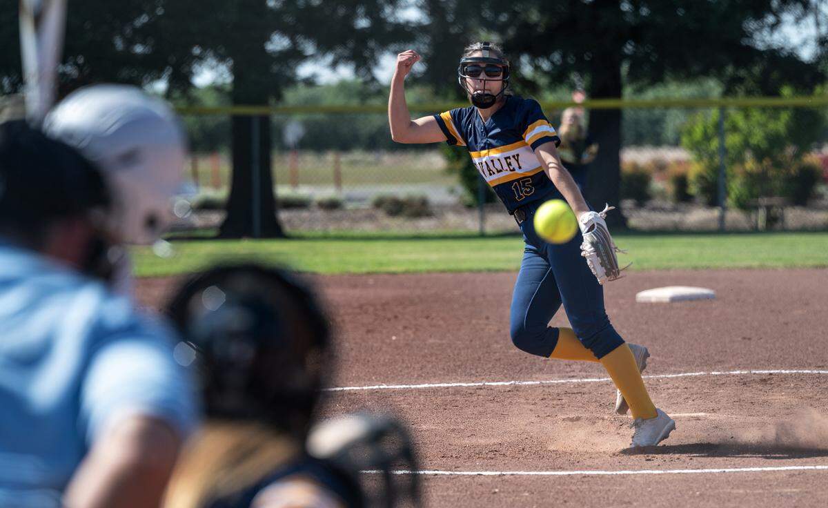 Sophomore Ava Hernandez delivers a pitch for Big Valley Christian in Modesto, Calif., on Thursday, April 28, 2022.