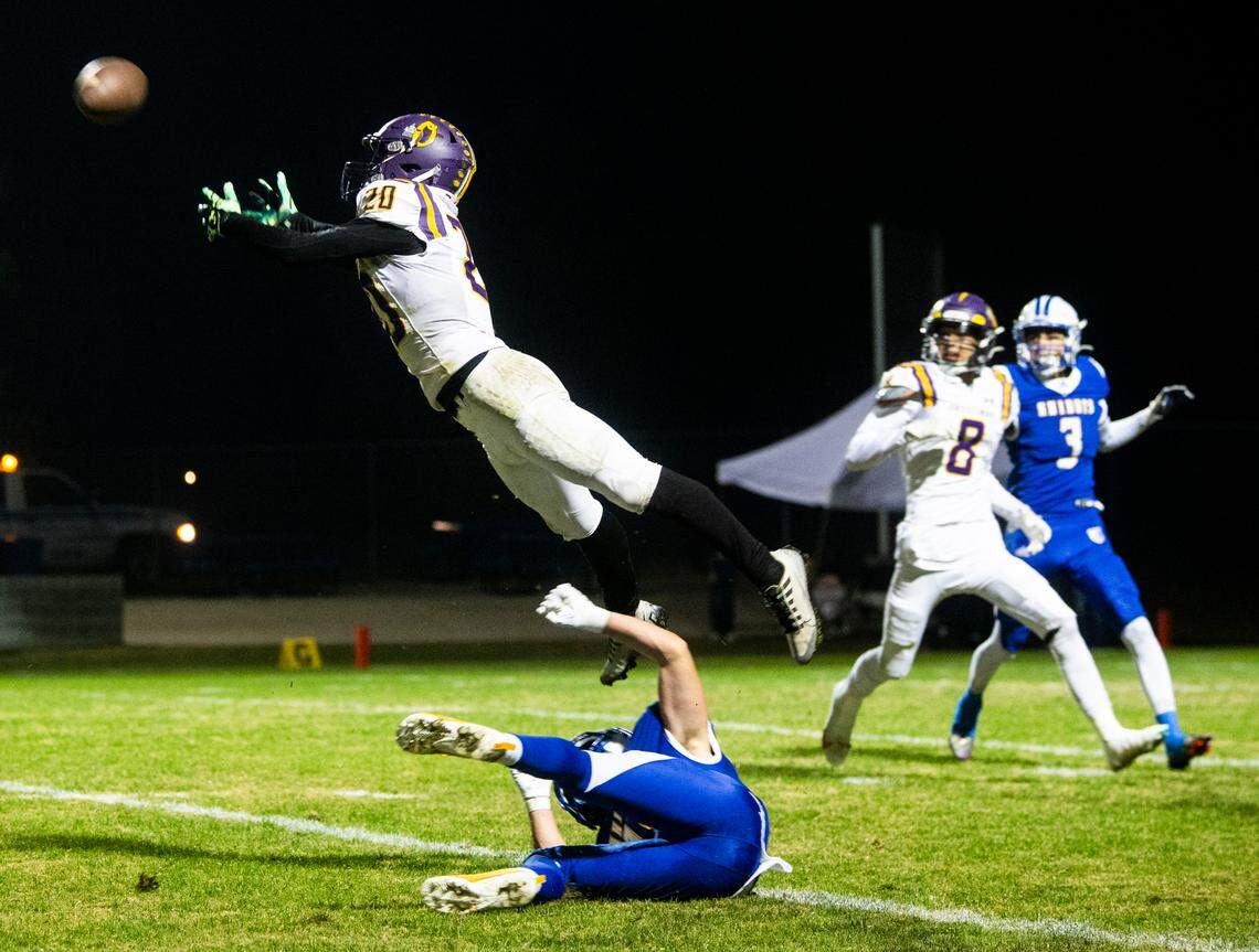 Orestimba’s Drew Felber (20) goes for an interception in the Sac-Joaquin Section Division VII-A Championship against Ripon Christian at Ripon Christian High School on Friday, Nov. 17, 2023.
