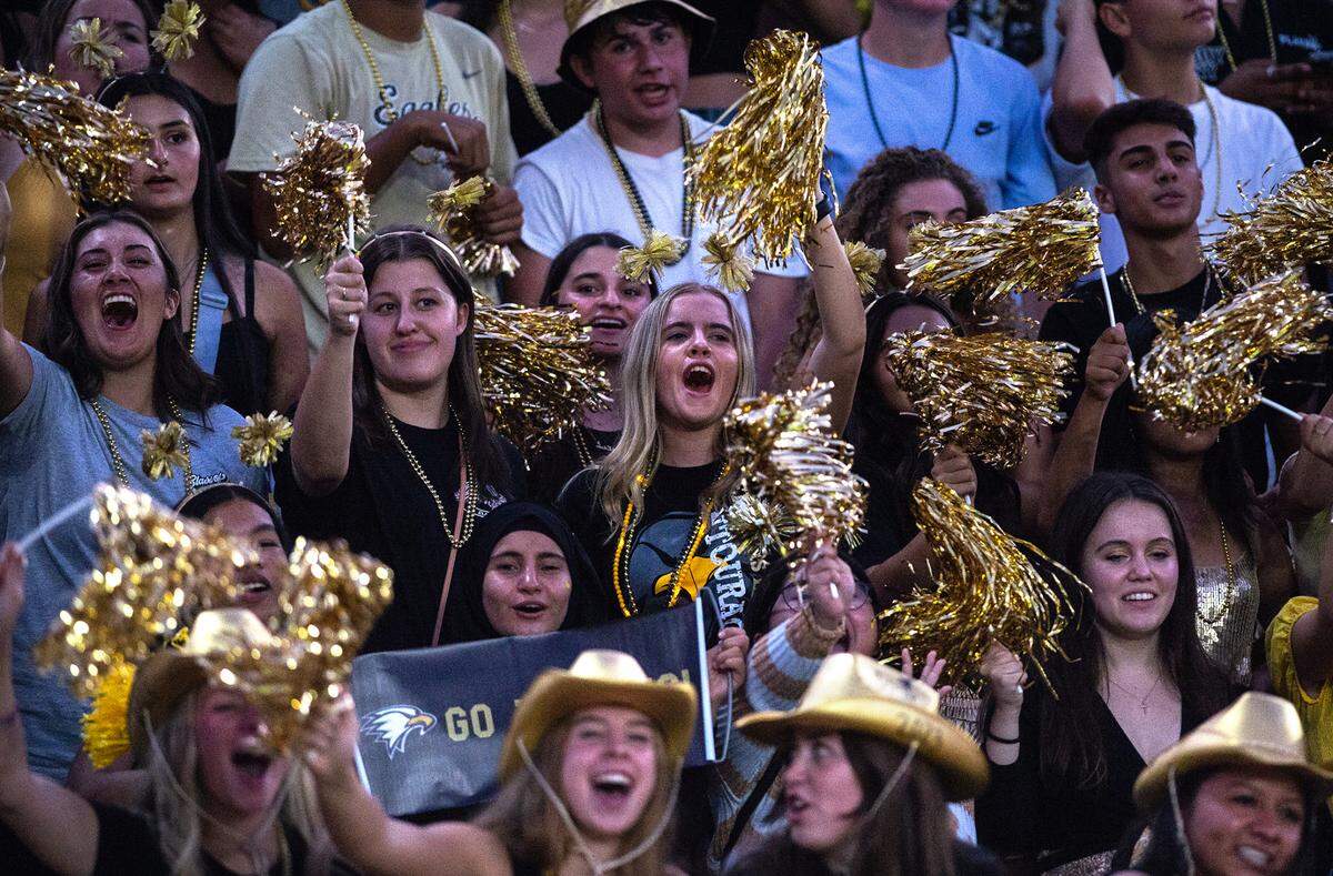 Enochs students cheer on their team during the Sylvan Bowl at Downey High School in Modesto, Calif., on Friday, August 19, 2022.