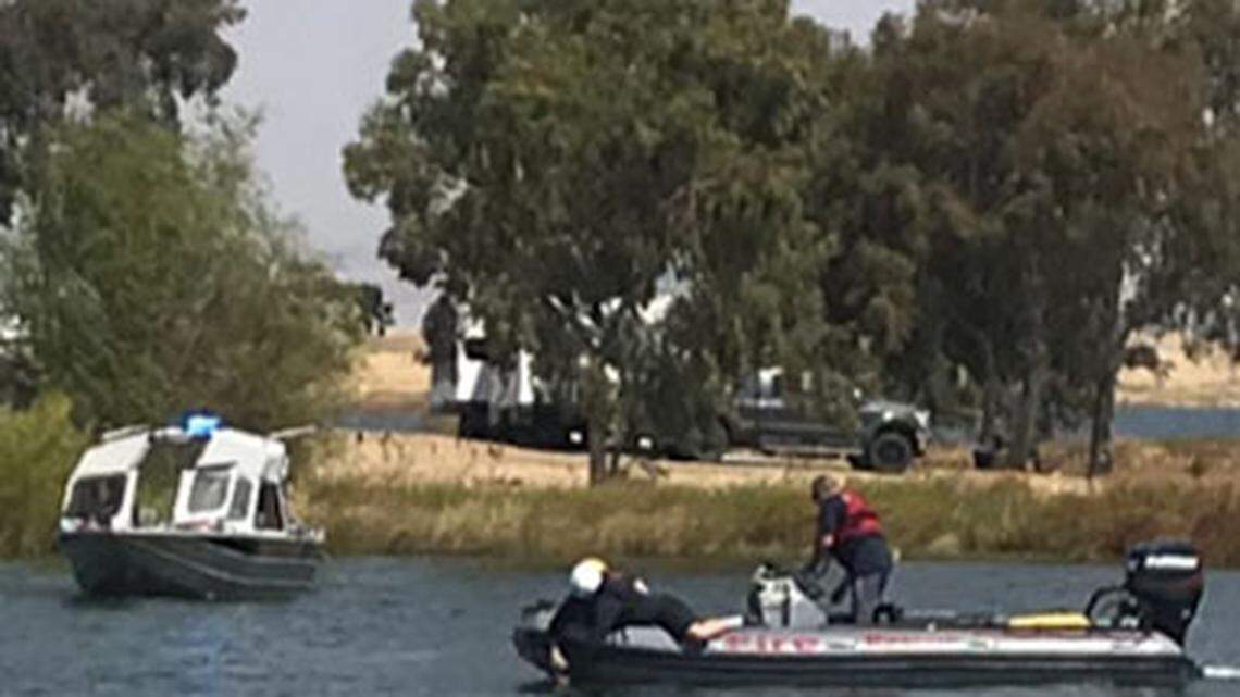 Stanislaus County deputies and Stanislaus Consolidated Fire Protection District firefighters search Woodward Reservoir on Monday, Sept. 3, 2018, for a missing swimmer.