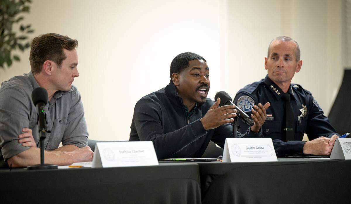 Panelist Austin Grant speaks during an NAACP forum on law enforcement at the King-Kennedy Center in Modesto, Tuesday, Feb. 18, 2025. Stanislaus County Sheriff’s Lt. Joshua Clayton is at left, and Modesto Police Chief Brandon Gillespie is at right.