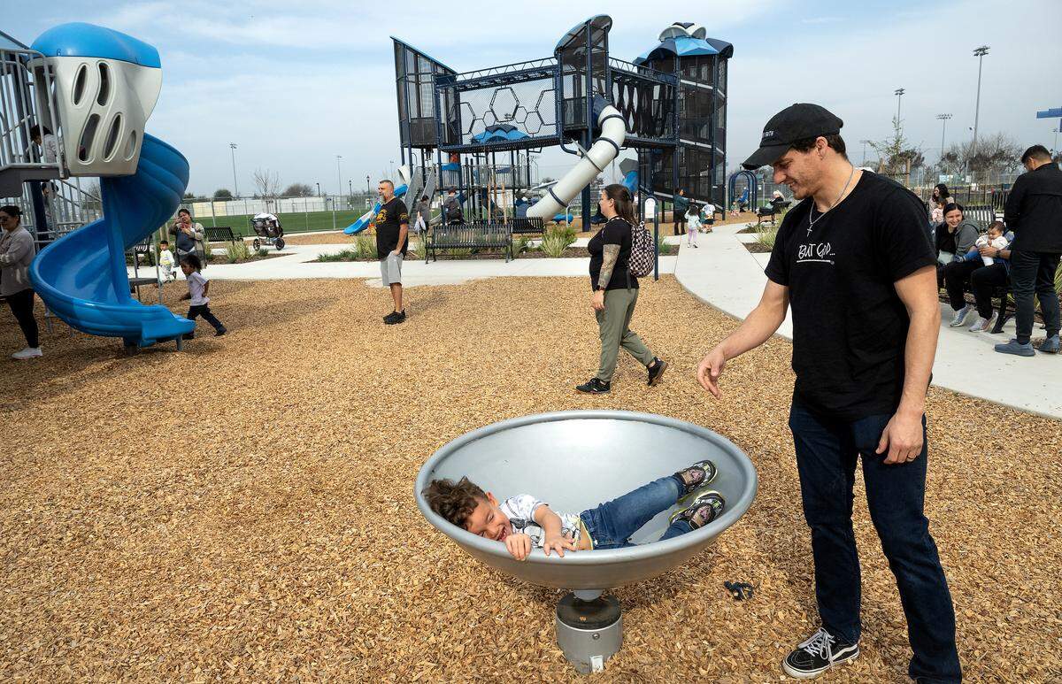 Gabe Kinney plays with his son James, 4, at Mary E. Grogan Community Park in Modesto on Friday, Feb. 6, 2026. 