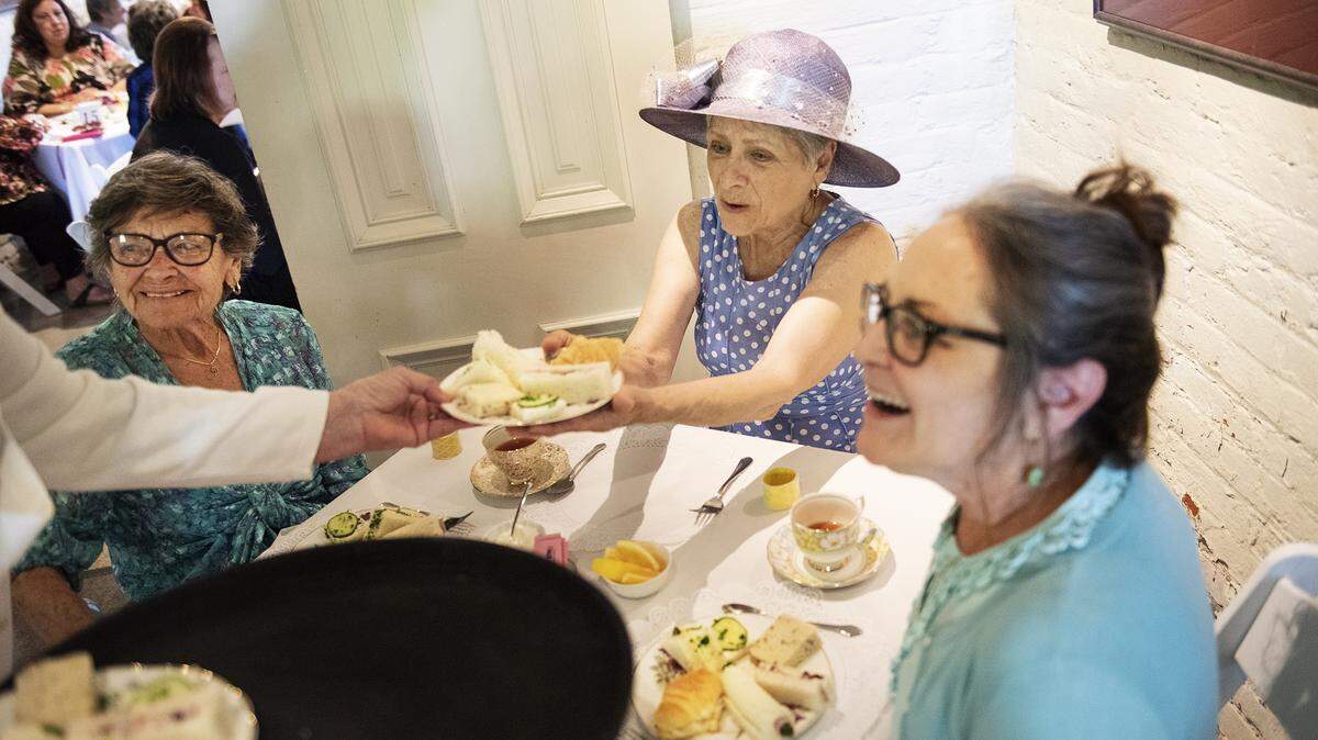Virginia Kuhn, middle, Jane Hanny, right, and Doris Hanny left, enjoy MotherÕs Day Tea at the McHenry Mansion on Saturday in Modesto, Calif., Saturday, May 11, 2019.