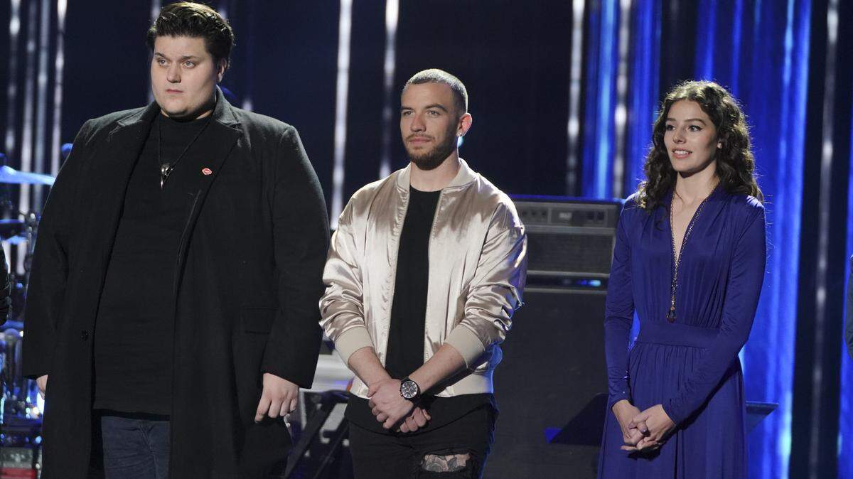 Modesto native Ryan Hammond (center) was eliminated from “American Idol” after performing his All-Star Duet with Broadway star Cynthia Erivo.