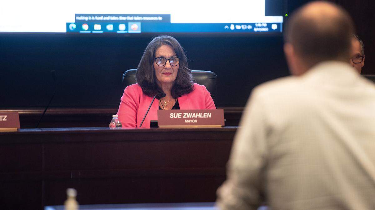 Modesto Mayor Sue Zwahlen listens to Will Kelly, Forward Together committee chairman, present a summary of its recommendations during a special session of the Modesto City Council in Modesto, Calif., on Thursday, August 11, 2022.