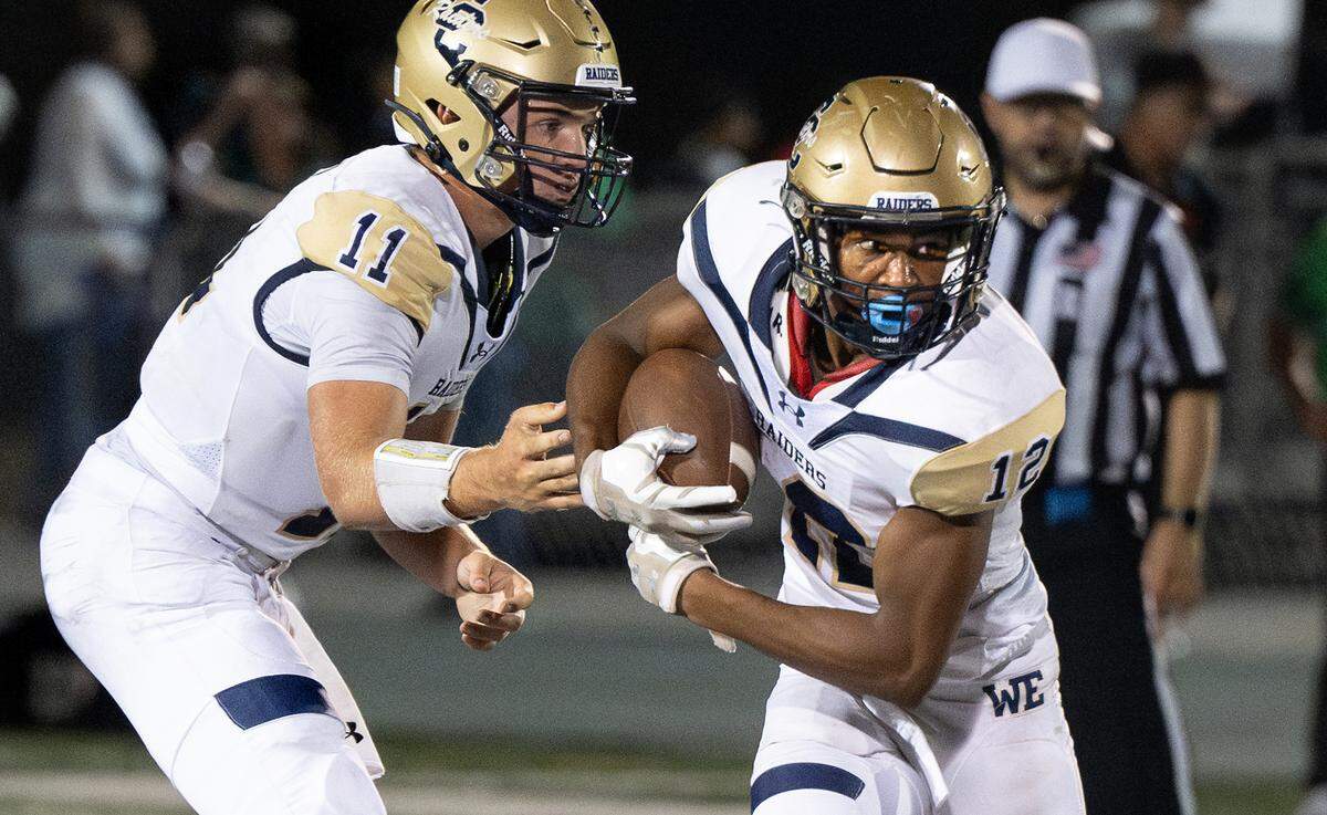 Central Catholic’s Joey Alcutt takes the handoff from quarterback Tyler Wentworth during the game with St. Mary’s in Stockton, Calif., Friday, August 25, 2023. St. Mary’s won the game 42-33.