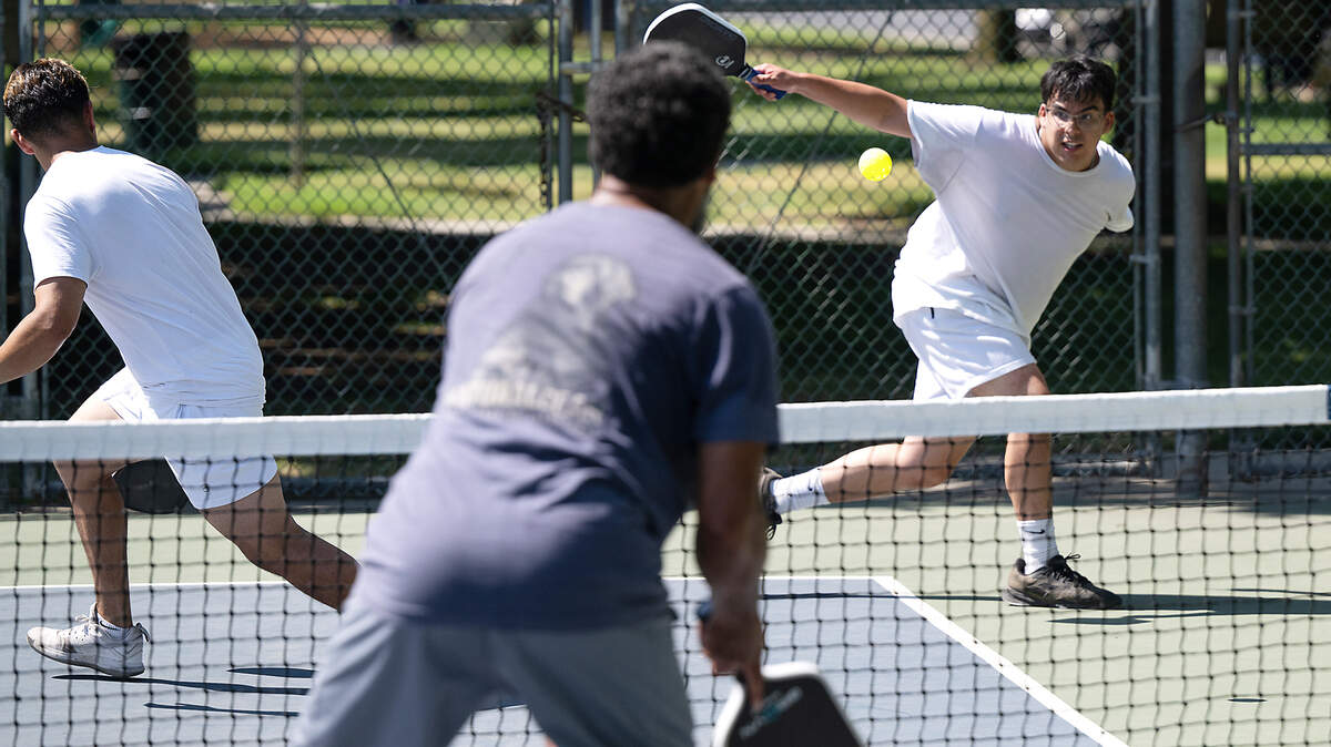Chaise Havens hits a backhand durin a game of pickleball at Graceada Park in Modesto, Calif., Saturday, July 22, 2023.