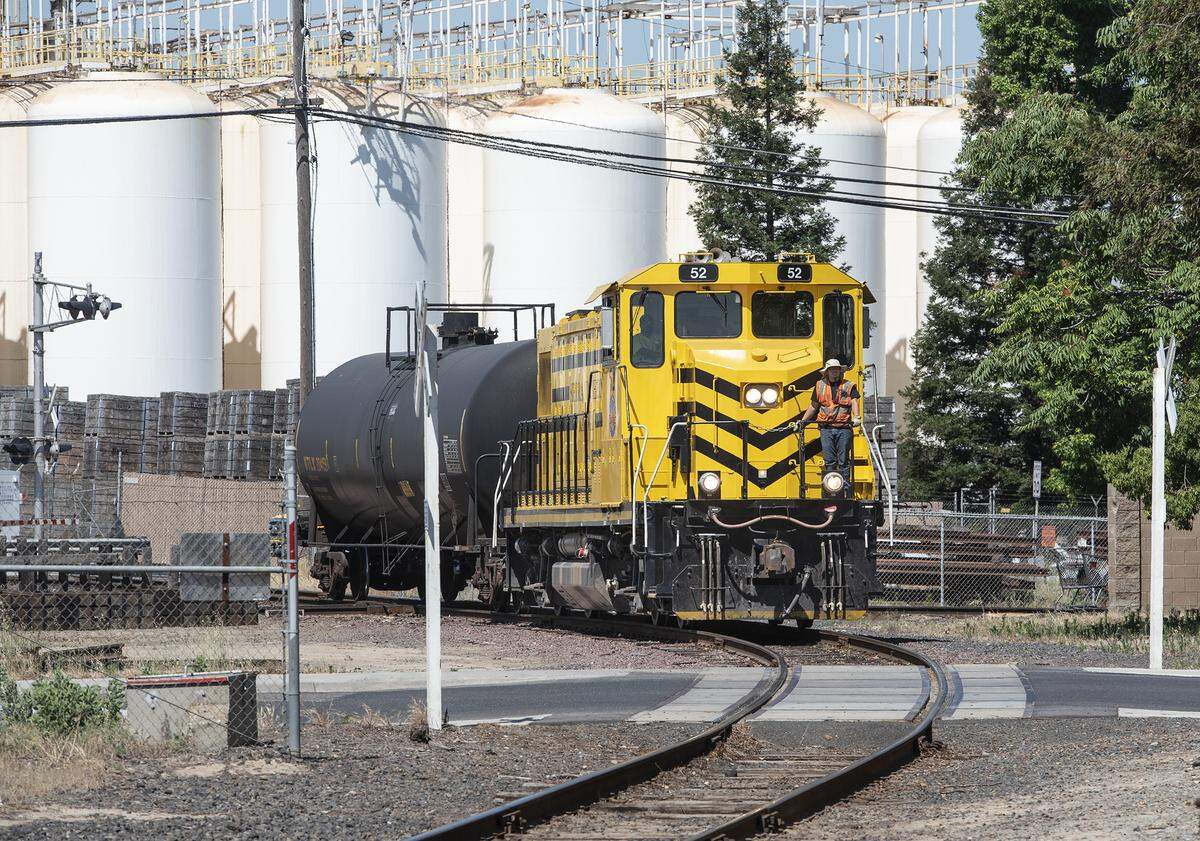An engine and crew arrive at the Sierra Northern Railway yard in Oakdale, Calif., Friday, June 14, 2019.