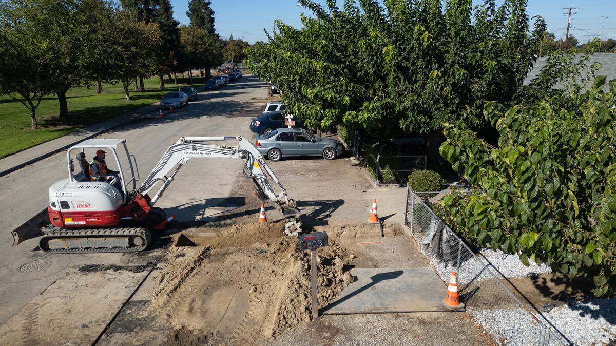 A crew begins underground work as part of the Parklawn Pedestrian Sidewalk Project in the Parklawn neighborhood in Modesto on Thursday, Oct. 16, 2025. 