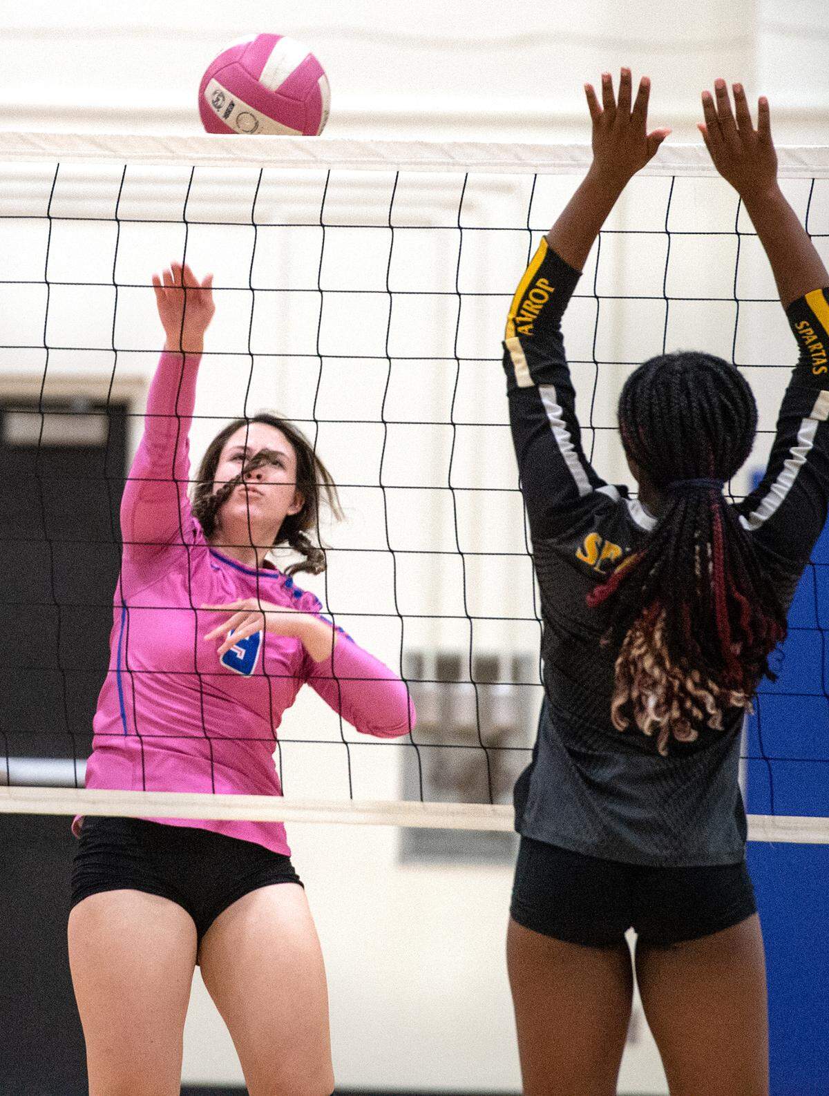 Beyer’s Olivia Saldivar Campbell returns the ball past Lathrop’s Alaba Olaleye during the Western Athletic Conference match at Beyer High School in Modesto, Calif., Tuesday, Oct. 4, 2022. Beyer won 3-0.